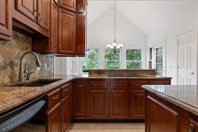9539 Shadow Crossing Ln, Chattanooga, TN 37421 - kitchen with black appliances, stone countertops, a chandelier, tasteful backsplash, and hanging light fixtures