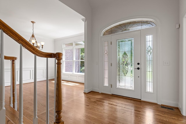 9539 Shadow Crossing Ln, Chattanooga, TN 37421 - entrance foyer featuring a chandelier and wood finished floors