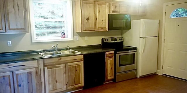 221 Cliftview Dr, Chattanooga, TN 37415 - kitchen featuring black appliances, dark countertops, and healthy amount of natural light