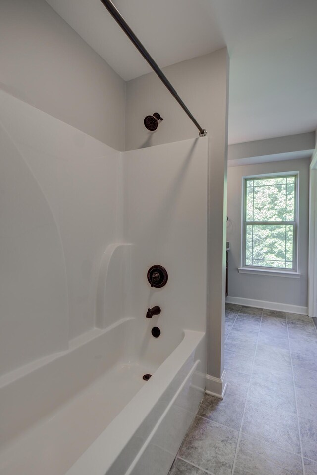 6253 River Stream Dr, Harrison, TN 37341 - bathroom with shower / bath combination and tile patterned floors
