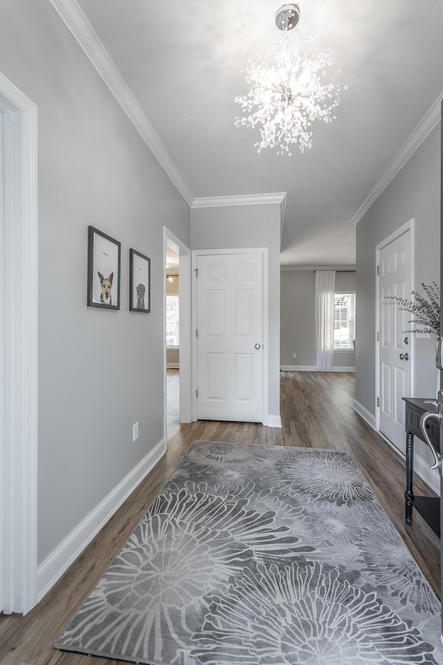 846 Altamont Rd, Chattanooga, TN 37415 - entrance foyer with wood finished floors, crown molding, and a chandelier