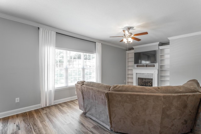 846 Altamont Rd, Chattanooga, TN 37415 - living room featuring crown molding, a fireplace, ceiling fan, and wood finished floors