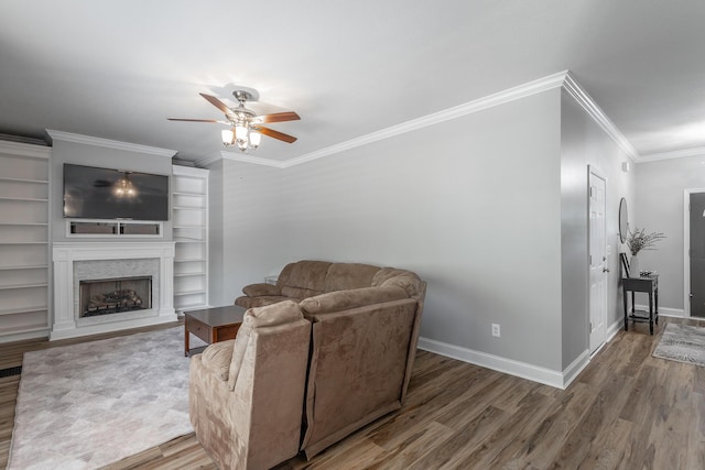 846 Altamont Rd, Chattanooga, TN 37415 - living room featuring wood finished floors, a ceiling fan, ornamental molding, and a fireplace