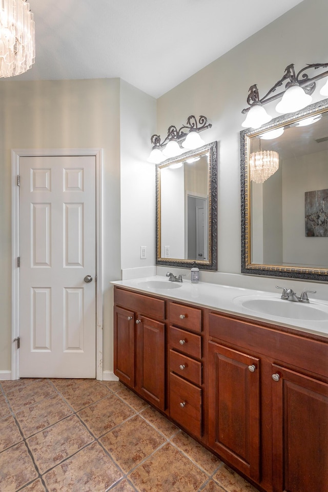 846 Altamont Rd, Chattanooga, TN 37415 - bathroom featuring a chandelier and double vanity