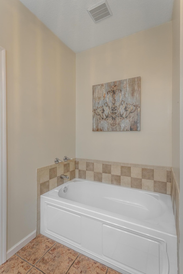 846 Altamont Rd, Chattanooga, TN 37415 - bathroom with a garden tub and tile patterned floors