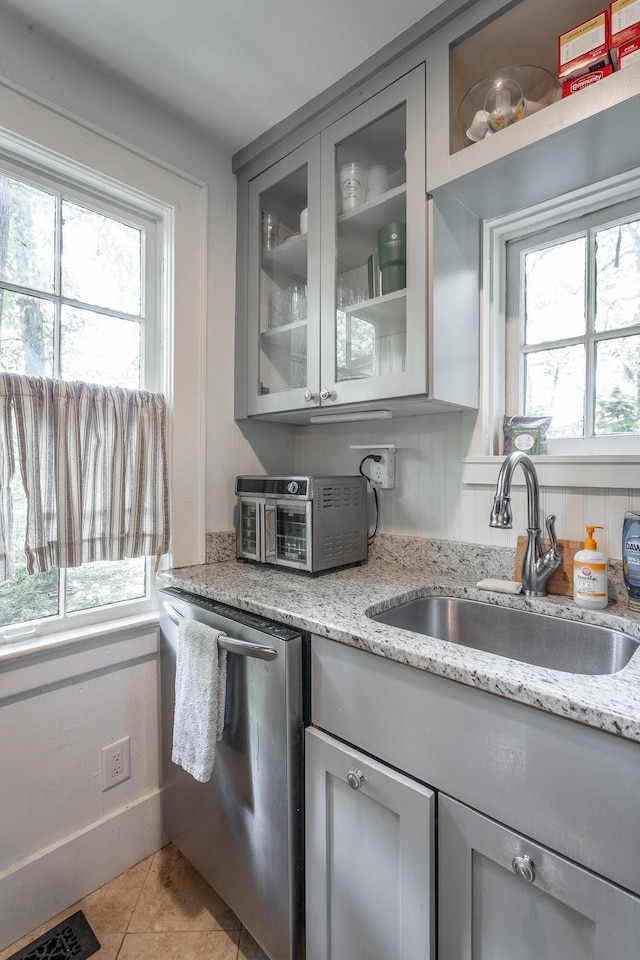2 Mother Goose Vlg, Lookout Mountain, GA 30750 - kitchen featuring dishwasher, gray cabinetry, light tile patterned flooring, and plenty of natural light