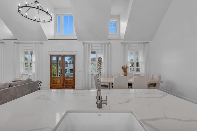9253 Skyfall Dr, Ooltewah, TN 37363 - entryway featuring a high ceiling, a chandelier, and healthy amount of natural light
