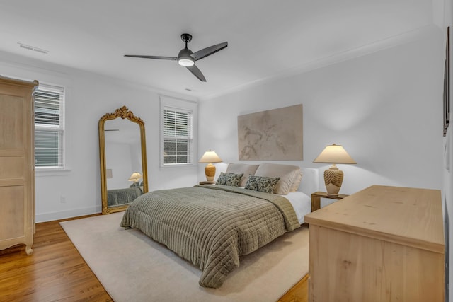 9253 Skyfall Dr, Ooltewah, TN 37363 - bedroom featuring light wood-type flooring and ceiling fan