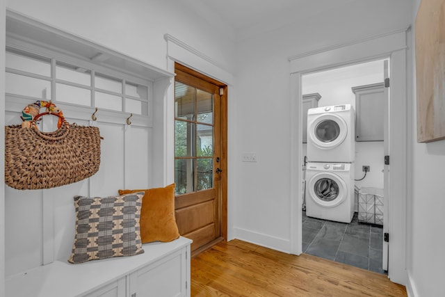 9253 Skyfall Dr, Ooltewah, TN 37363 - laundry area with stacked washer / drying machine and light wood-style floors
