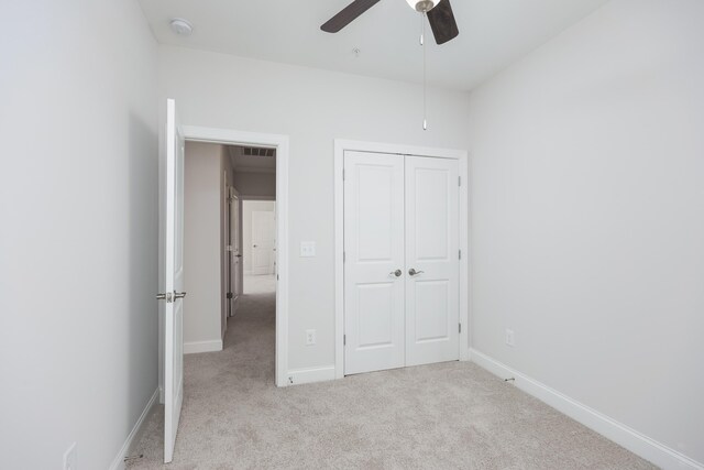 1978 Mitchell Ave Unit 21, Chattanooga, TN 37408 - unfurnished bedroom featuring carpet flooring, a closet, and ceiling fan