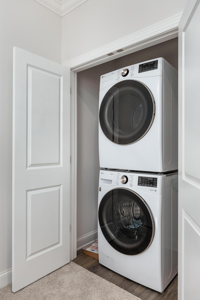 1978 Mitchell Ave Unit 21, Chattanooga, TN 37408 - laundry room with stacked washer and clothes dryer and crown molding