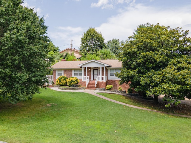 6413 Edgmon Dr, Chattanooga, TN 37421 - view of front of home featuring brick siding and a front yard