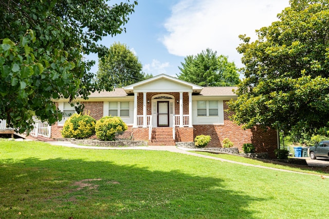 6413 Edgmon Dr, Chattanooga, TN 37421 - view of front of house featuring brick siding and a front yard