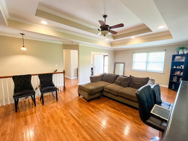 6413 Edgmon Dr, Chattanooga, TN 37421 - living room with a tray ceiling, light wood finished floors, ceiling fan, and ornamental molding