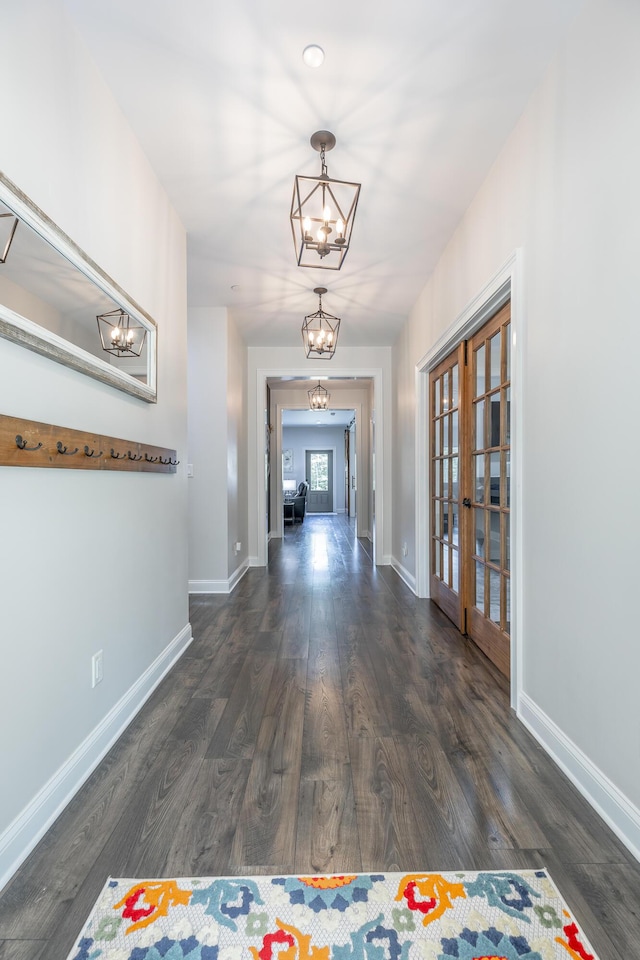 143 Walden Dr, Signal Mountain, TN 37377 - hallway featuring a chandelier, french doors, and wood finished floors