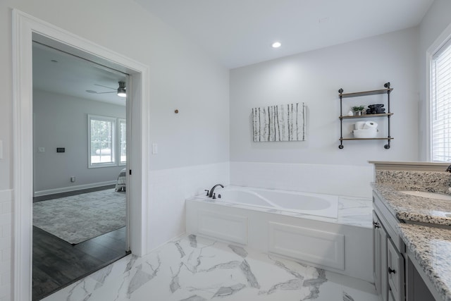143 Walden Dr, Signal Mountain, TN 37377 - bathroom featuring a bath, vanity, marble finish floors, ceiling fan, and recessed lighting