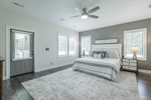 143 Walden Dr, Signal Mountain, TN 37377 - bedroom with multiple windows, dark wood-style flooring, and ceiling fan