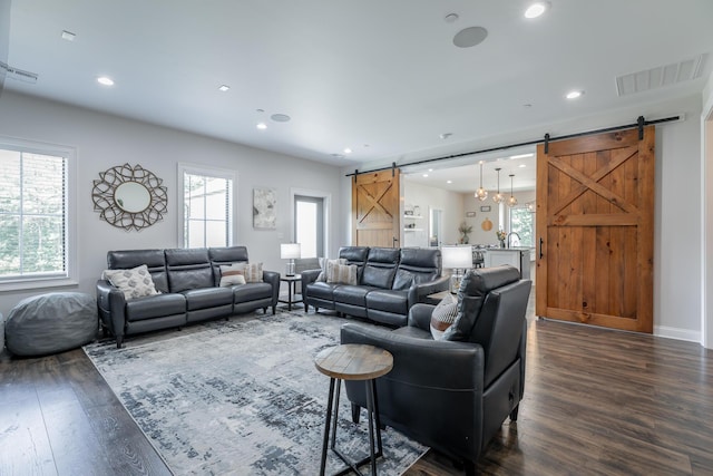 143 Walden Dr, Signal Mountain, TN 37377 - living room with a barn door, dark wood-style flooring, healthy amount of natural light, and recessed lighting