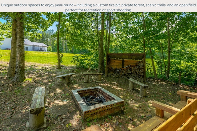 143 Walden Dr, Signal Mountain, TN 37377 - view of grassy yard with an outdoor fire pit