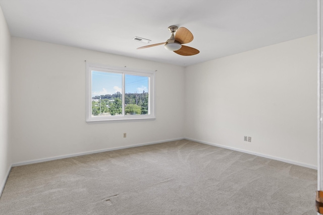 4920 Pine Cir, Ooltewah, TN 37363 - carpeted spare room with baseboards and a ceiling fan