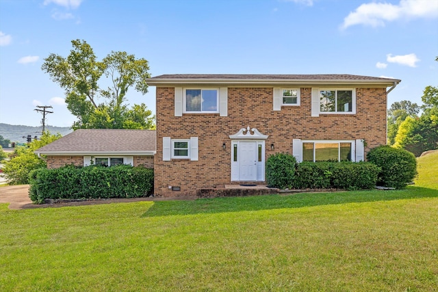 4920 Pine Cir, Ooltewah, TN 37363 - colonial inspired home with brick siding and a front yard