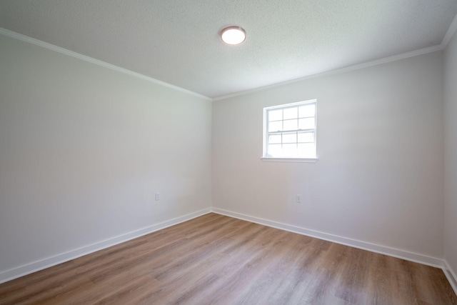 103 Laurel Dr, Chattanooga, TN 37415 - spare room with light wood-type flooring, ornamental molding, and a textured ceiling