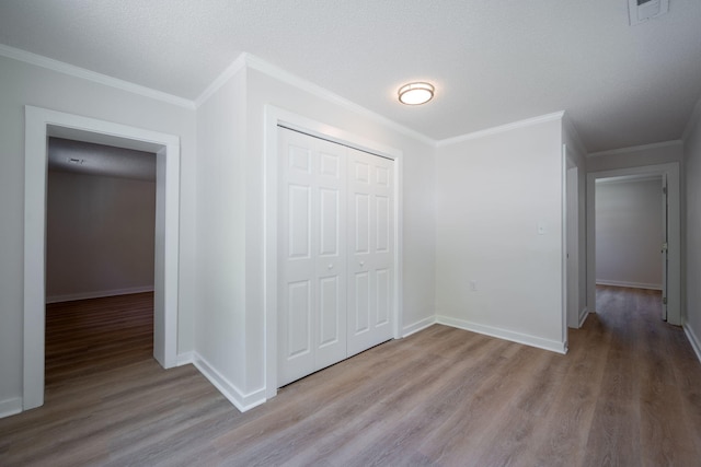 103 Laurel Dr, Chattanooga, TN 37415 - unfurnished bedroom with wood finished floors, a closet, and ornamental molding