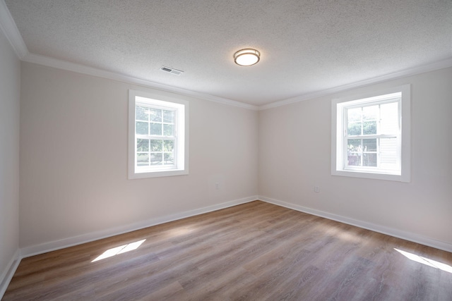 103 Laurel Dr, Chattanooga, TN 37415 - empty room featuring crown molding, wood finished floors, and a textured ceiling