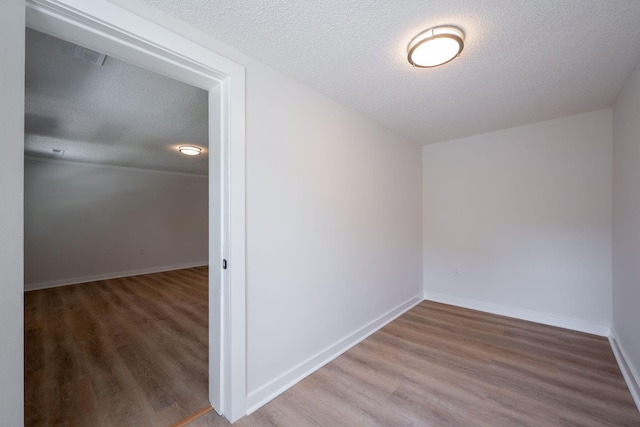 103 Laurel Dr, Chattanooga, TN 37415 - empty room featuring a textured ceiling and wood finished floors