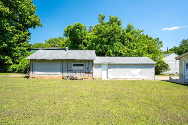 103 Laurel Dr, Chattanooga, TN 37415 - view of front of home with a front lawn, board and batten siding, and a shingled roof