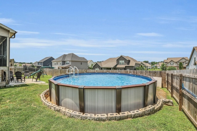 7459 Red Poppy Dr, Ooltewah, TN 37363 - view of pool with a residential view, a fenced backyard, and a playground