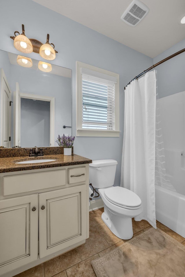 7459 Red Poppy Dr, Ooltewah, TN 37363 - bathroom with vanity, shower / bath combo with shower curtain, and tile patterned flooring