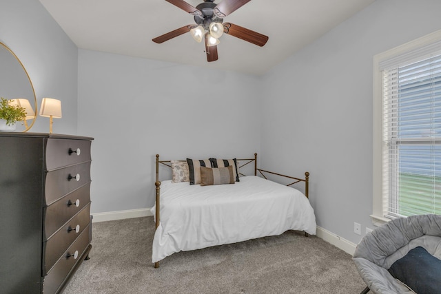 7459 Red Poppy Dr, Ooltewah, TN 37363 - carpeted bedroom with baseboards and a ceiling fan