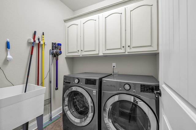 7459 Red Poppy Dr, Ooltewah, TN 37363 - washroom with cabinet space and washing machine and dryer