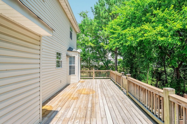 8616 River Cove Dr, Harrison, TN 37341 - wooden deck with view of wooded area