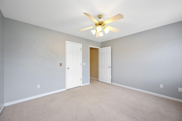 8616 River Cove Dr, Harrison, TN 37341 - unfurnished bedroom featuring carpet floors and a ceiling fan