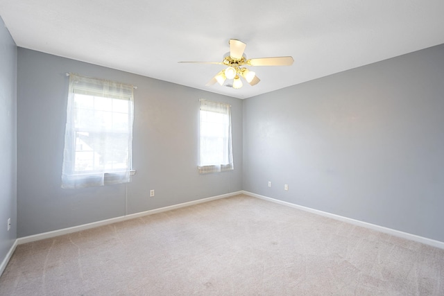 8616 River Cove Dr, Harrison, TN 37341 - carpeted empty room featuring ceiling fan and baseboards