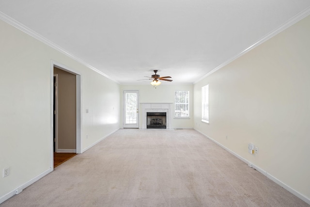 8616 River Cove Dr, Harrison, TN 37341 - unfurnished living room with a ceiling fan, ornamental molding, light colored carpet, and a high end fireplace