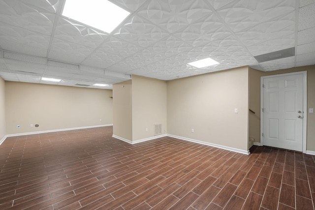 8616 River Cove Dr, Harrison, TN 37341 - finished below grade area featuring wood finished floors and a drop ceiling