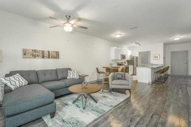804 Riverfront Pkwy Unit 401, Chattanooga, TN 37402 - living area with dark wood-type flooring and ceiling fan