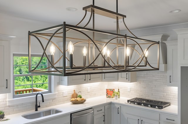 234 Goose Creek Cir, Soddy Daisy, TN 37379 - kitchen featuring appliances with stainless steel finishes, tasteful backsplash, white cabinets, and light countertops
