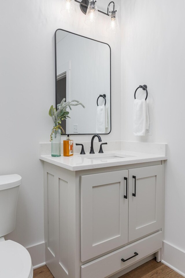 234 Goose Creek Cir, Soddy Daisy, TN 37379 - half bath featuring vanity and wood finished floors