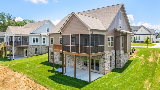 234 Goose Creek Cir, Soddy Daisy, TN 37379 - back of house featuring a sunroom, a patio area, a yard, stone siding, and french doors