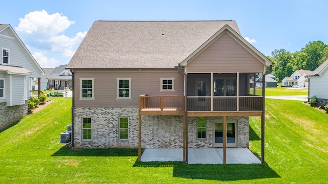 234 Goose Creek Cir, Soddy Daisy, TN 37379 - rear view of house with a patio area, a lawn, and a sunroom