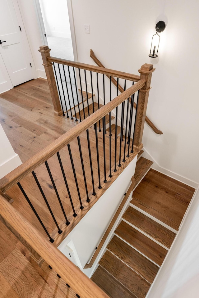 234 Goose Creek Cir, Soddy Daisy, TN 37379 - staircase featuring wood finished floors and baseboards