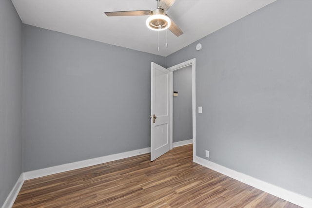 620 Lullwater Rd, Chattanooga, TN 37405 - unfurnished room with wood finished floors, a ceiling fan, and a smoke detector