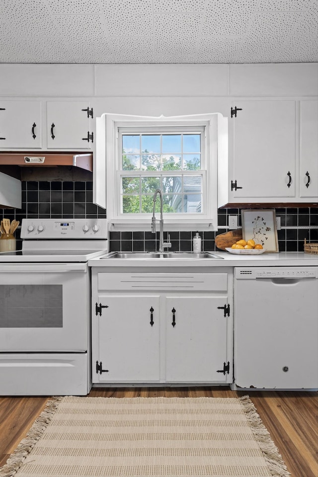 620 Lullwater Rd, Chattanooga, TN 37405 - kitchen with white appliances, white cabinetry, and tasteful backsplash