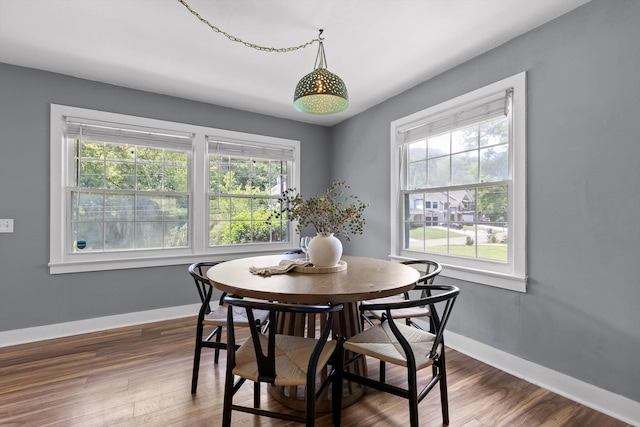 620 Lullwater Rd, Chattanooga, TN 37405 - dining room with baseboards and dark wood-style flooring