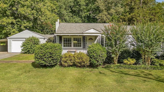620 Lullwater Rd, Chattanooga, TN 37405 - view of front of home with a front yard, a carport, and a chimney