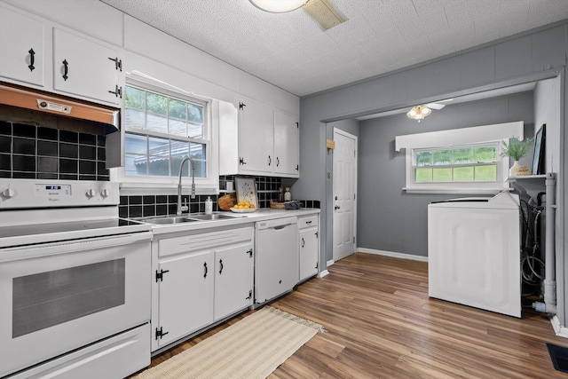 620 Lullwater Rd, Chattanooga, TN 37405 - kitchen with white appliances, washer / clothes dryer, plenty of natural light, and white cabinetry